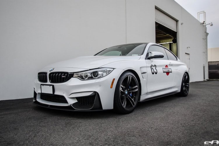 This BMW M4 Mineral White stands out with its aero upgrades
