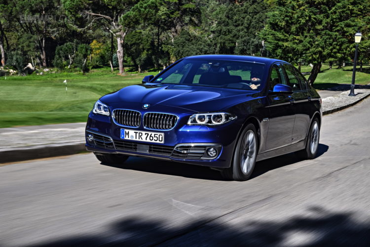 BMW F10 5 Series luxury sedan in motion