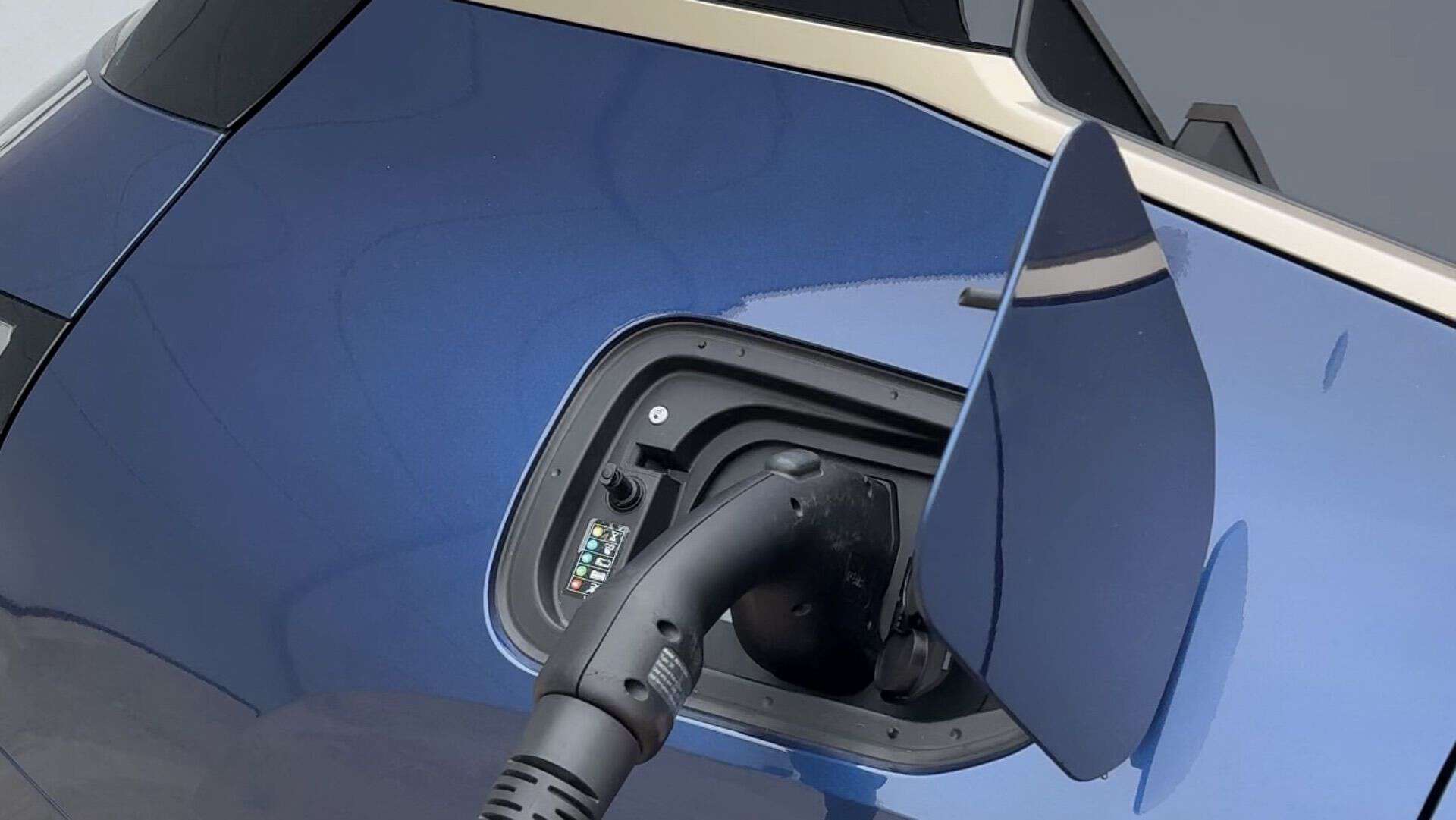 BMW iX using Plug & Charge at an Electrify America fast charger in the U.S.