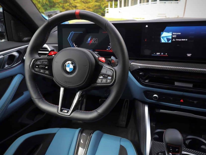 New squared-off steering wheel and digital iDrive 8.5 screen in BMW M4