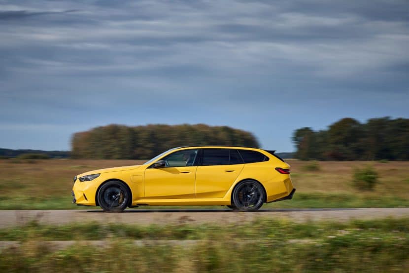 2025 BMW M5 Touring Speed Yellow side view