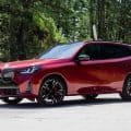2025 BMW X3 M50 FIRE RED side view