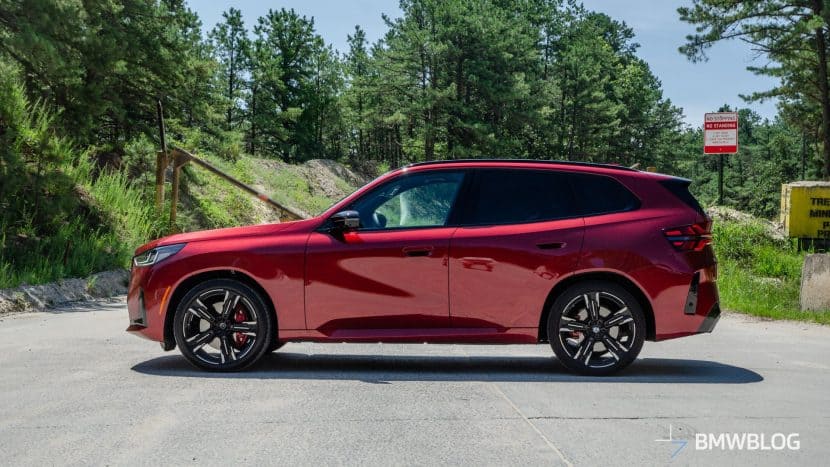 2025 BMW X3 M50 FIRE RED side view