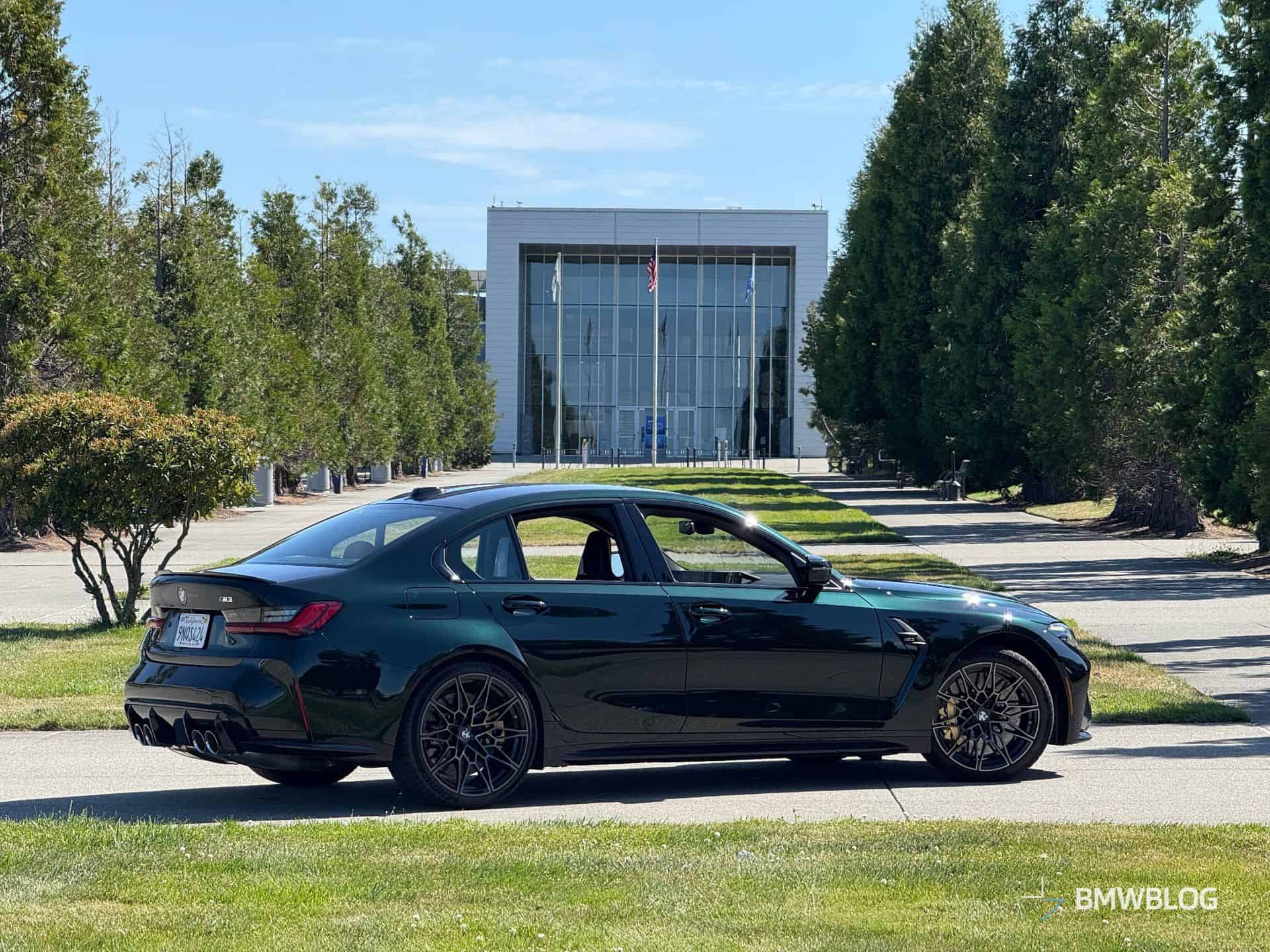 2025 BMW M3 Sedan Dark Emerald Metallic rear three-quarter view