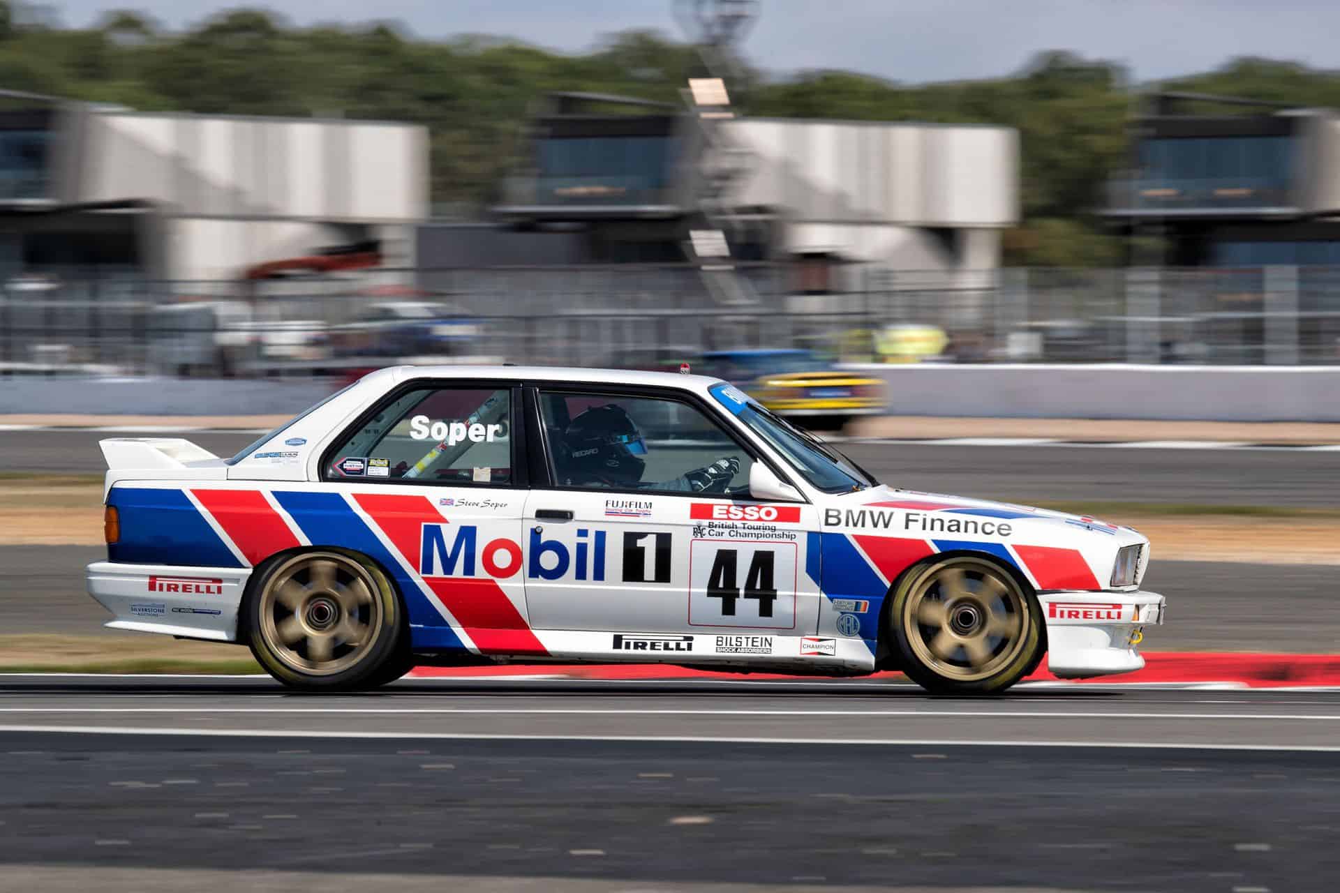 BMW M3 E30 Group A Bastos livery racing at Silverstone Classic 2025