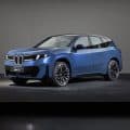 2026 BMW iX3 Neue Klasse SUV front view with illuminated grille
