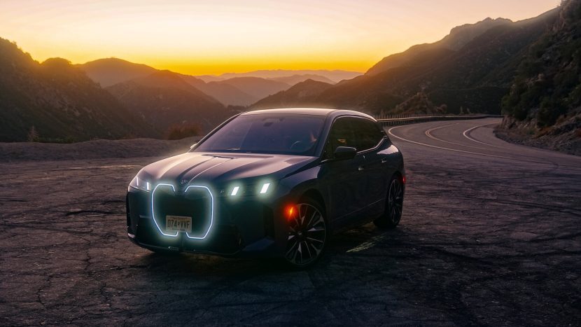2026 BMW IX M70 with glowing headlights