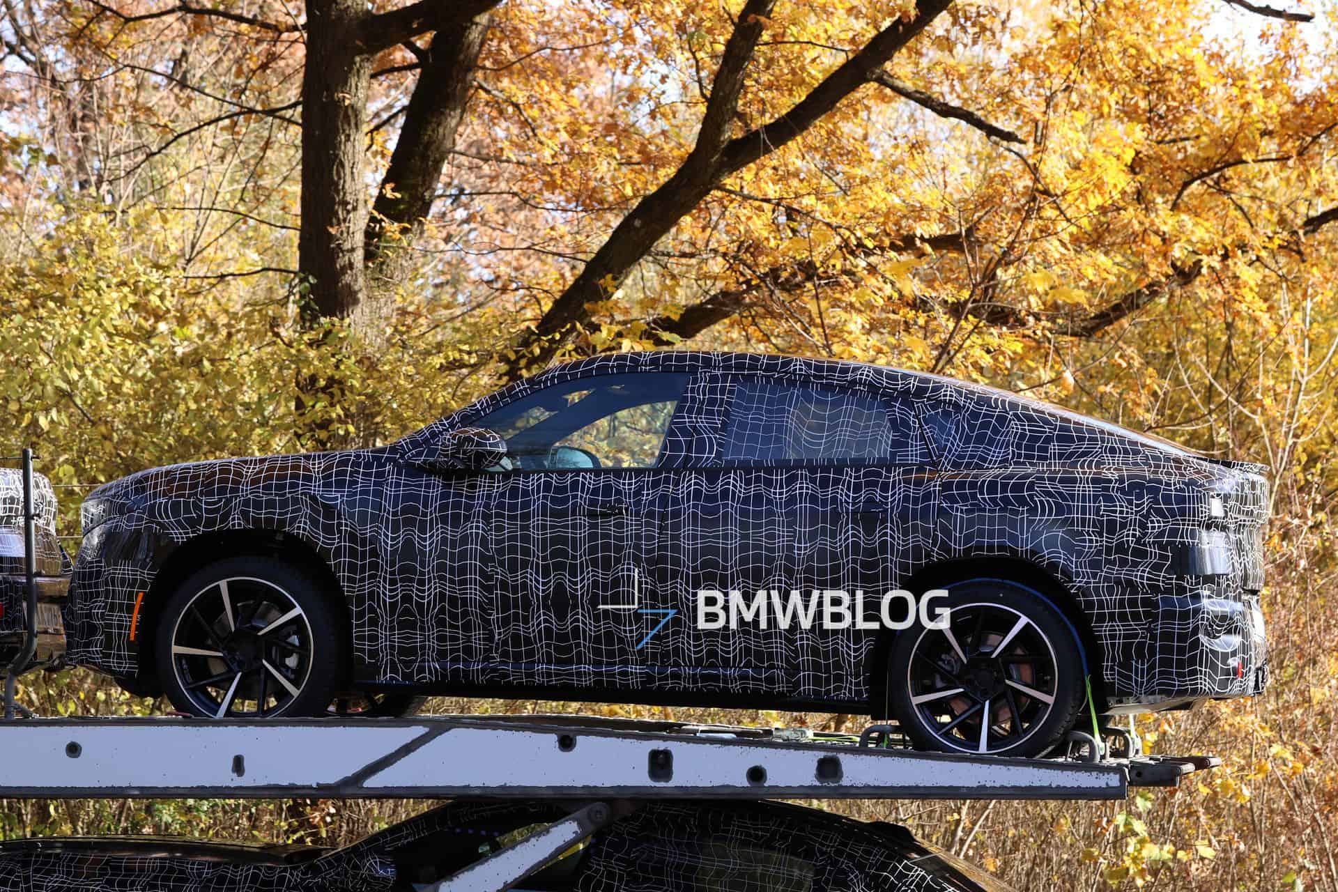 2027 BMW iX4 prototype spied testing with sloping coupe roofline