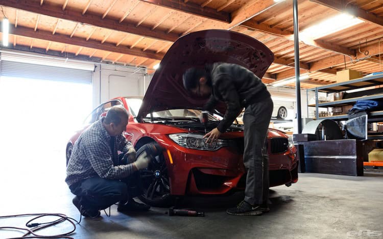 Sakhir Orange BMW F82 M4 In For Some Modifications At EAS
