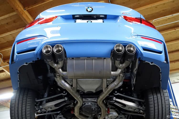 Yas Marina Blue BMW M4 Receives An Akrapovic Exhaust System