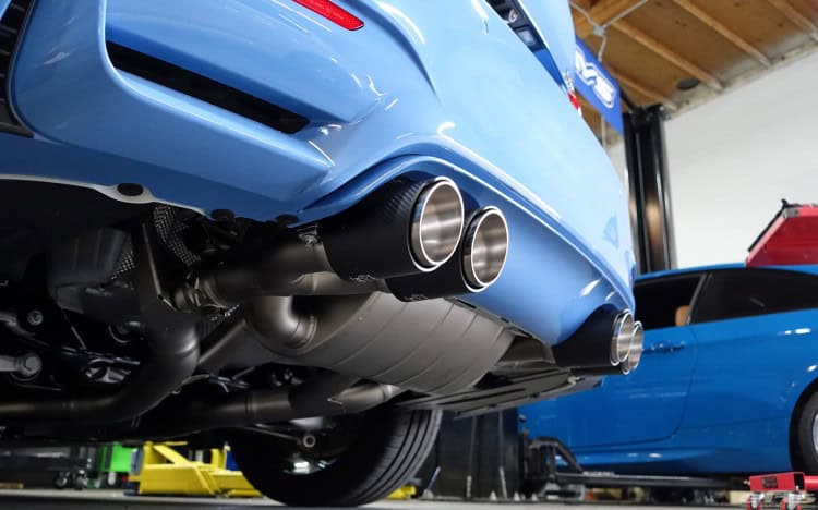 Yas Marina Blue BMW M4 Receives An Akrapovic Exhaust System