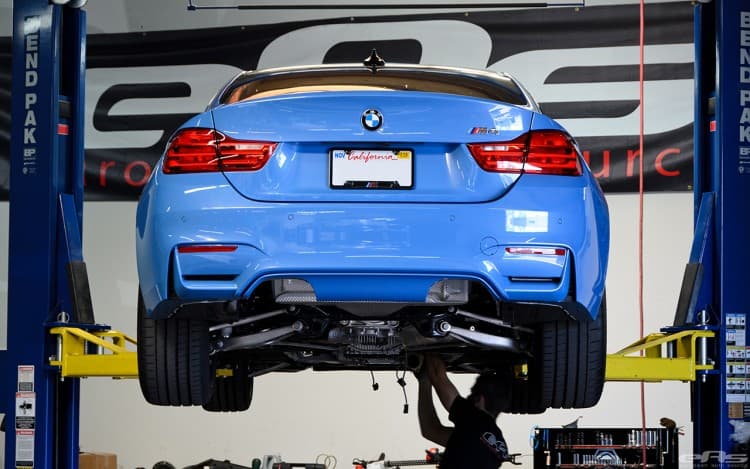 Akrapovic Exhaust And ER Downpipes For A Yas Marina Blue M4
