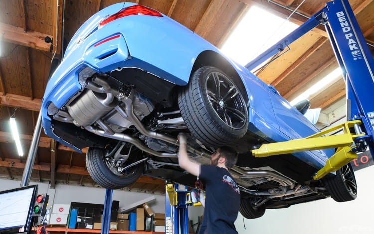 Akrapovic Exhaust And ER Downpipes For A Yas Marina Blue M4