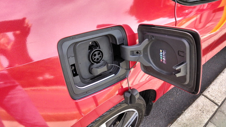 The dangling plastic charge port cap seen here isn't really too high on my list of annoyances, but I have heard quite a few other i3 owners complain about it. I even know a couple that have cut it off.